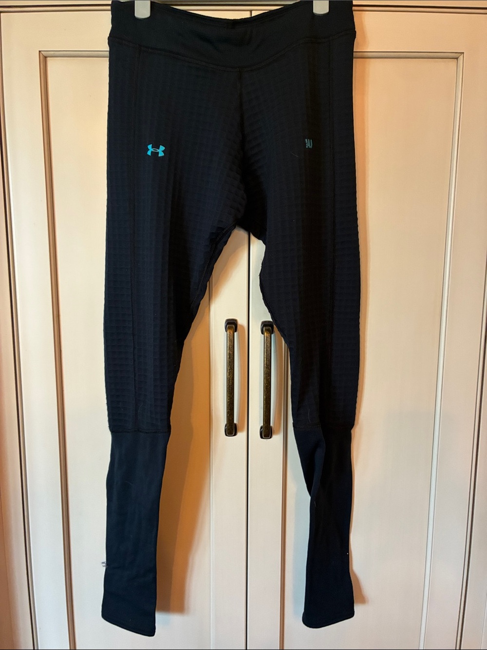 Under Armour Black Leggings with Teal Logo Accent (cold gear base layer)